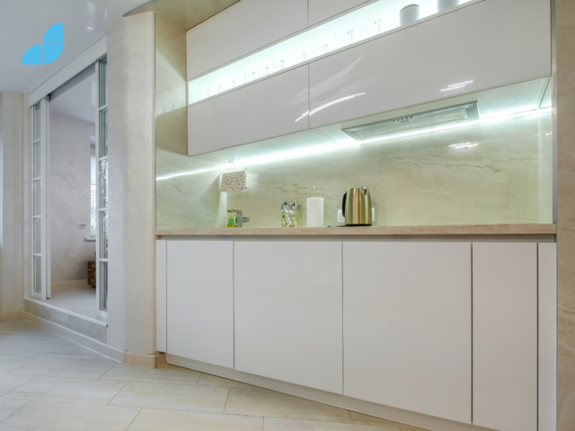 A minimalist white kitchen design.